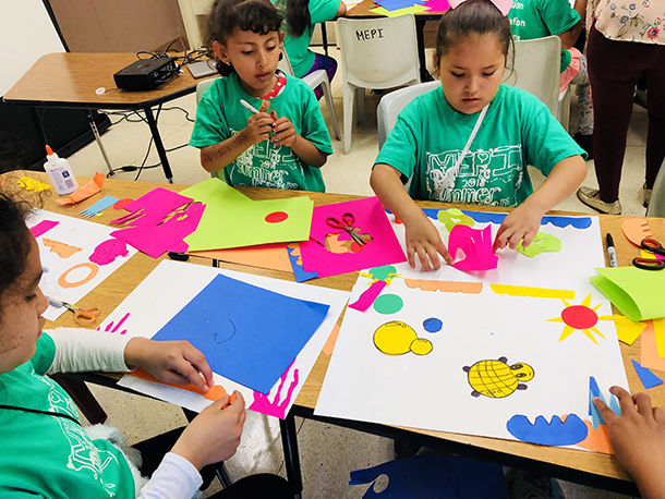 Neighborhood kids creating art collages