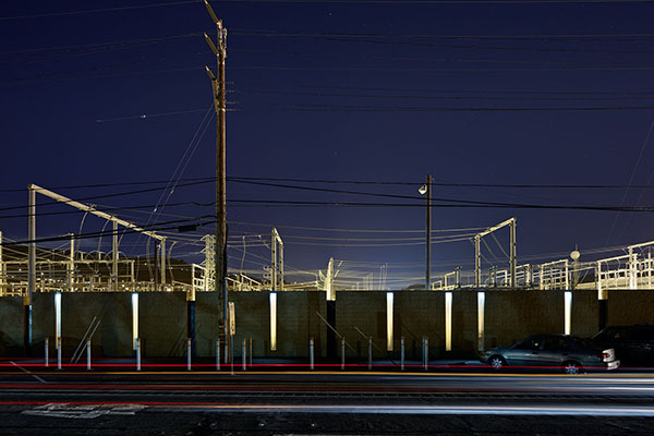 Night shot of PG&E Wall